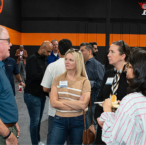 Texas Pickleball players gathering together during an indoor pickleball social event