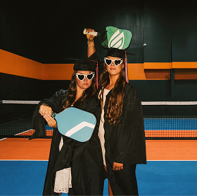 Texas Pickleball players wearing fun costumes at a themed indoor pickleball event in Roanoke TX