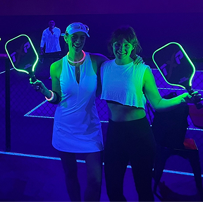 Texas Pickleball glow party event with players enjoying neon pickleball games indoors in Roanoke TX